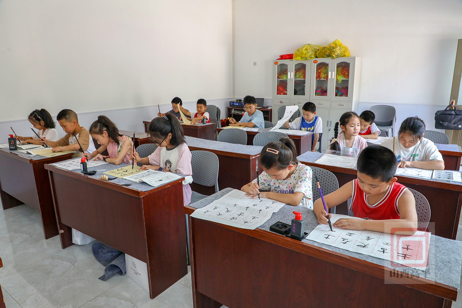 爱心书法班点亮孩子的暑期生活