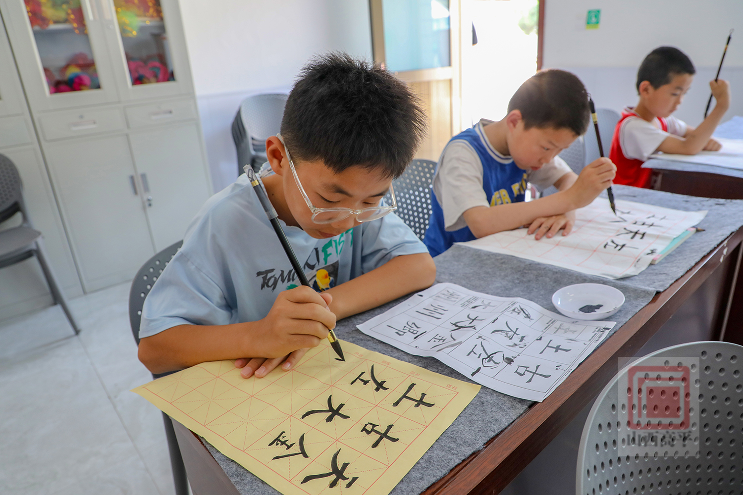 爱心书法班点亮孩子的暑期生活